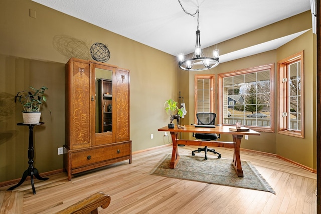 4167 Hallgren Ln, Excelsior, MN 55331 - office with a chandelier, light wood-type flooring, and baseboards