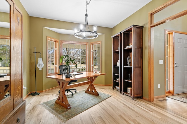 4167 Hallgren Ln, Excelsior, MN 55331 - office with a chandelier, plenty of natural light, light wood-type flooring, and baseboards