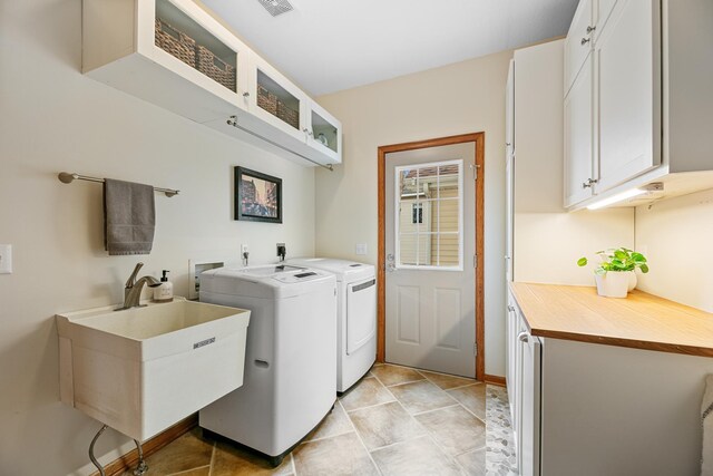 4167 Hallgren Ln, Excelsior, MN 55331 - clothes washing area featuring cabinet space and independent washer and dryer