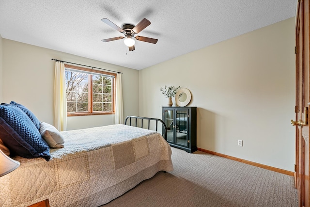 4167 Hallgren Ln, Excelsior, MN 55331 - bedroom with carpet, baseboards, a ceiling fan, and a textured ceiling