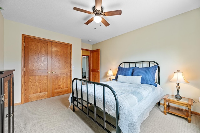 4167 Hallgren Ln, Excelsior, MN 55331 - carpeted bedroom with a closet and ceiling fan