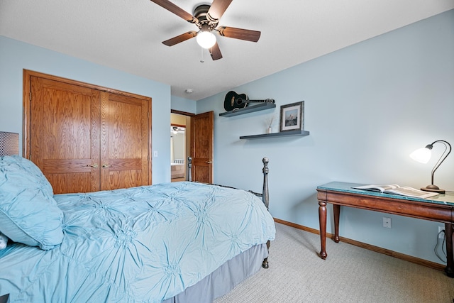 4167 Hallgren Ln, Excelsior, MN 55331 - carpeted bedroom with baseboards, ceiling fan, a closet, and an office area