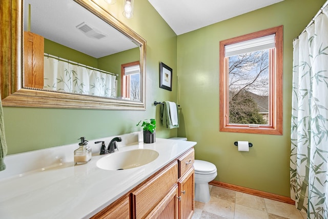 4167 Hallgren Ln, Excelsior, MN 55331 - full bath with baseboards, vanity, and toilet