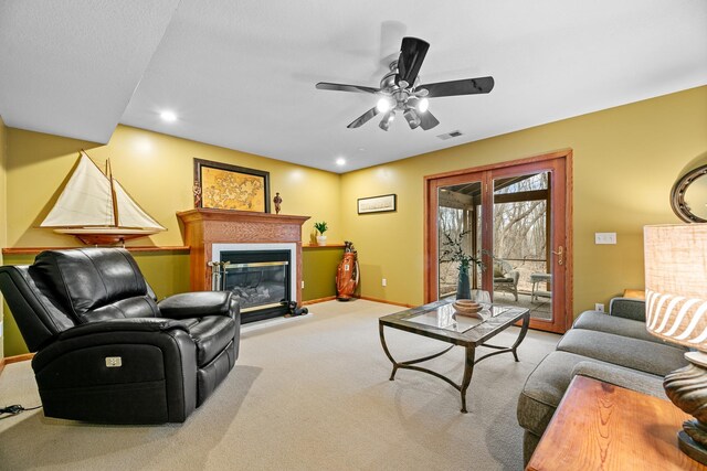 4167 Hallgren Ln, Excelsior, MN 55331 - living area featuring carpet flooring, a ceiling fan, a glass covered fireplace, recessed lighting, and baseboards