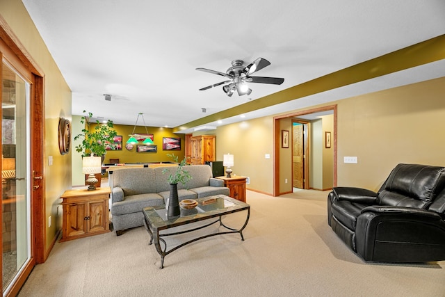 4167 Hallgren Ln, Excelsior, MN 55331 - living room featuring light colored carpet, a ceiling fan, and baseboards