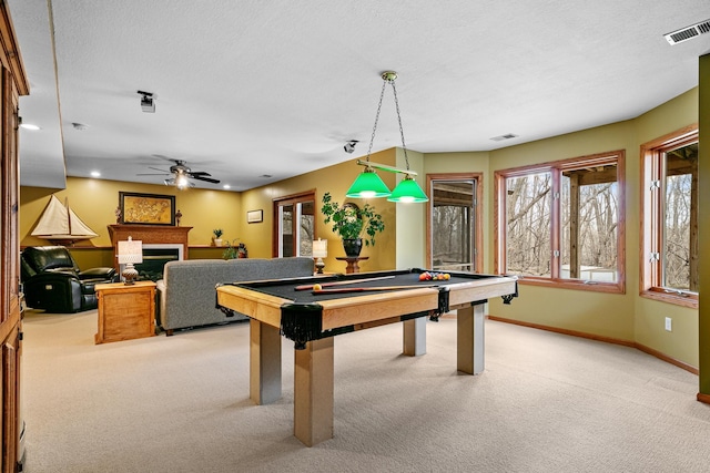 4167 Hallgren Ln, Excelsior, MN 55331 - playroom featuring light carpet, billiards, baseboards, a fireplace, and ceiling fan