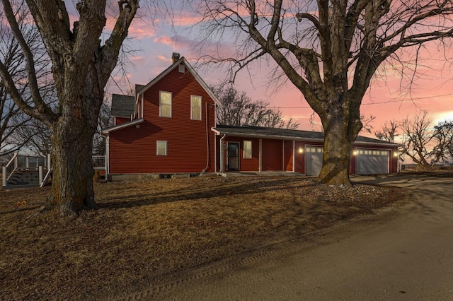 view of front of property with a garage