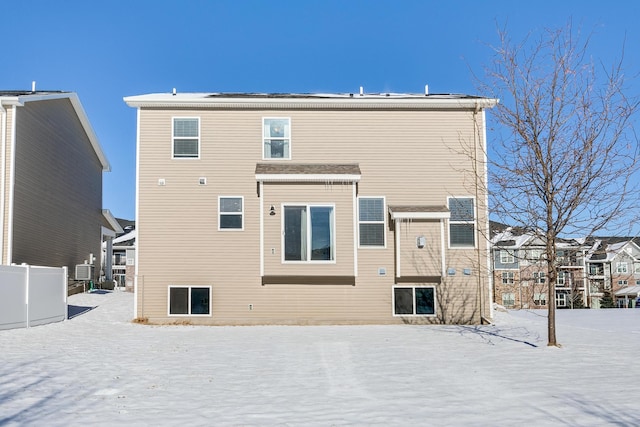 view of snow covered house