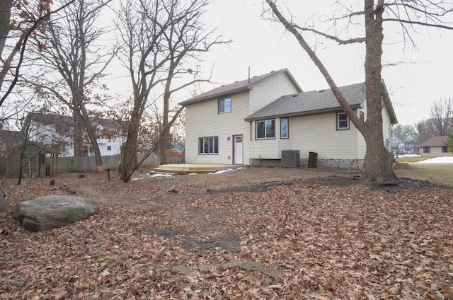 back of house featuring cooling unit and a patio