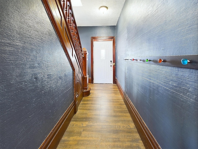 hallway featuring dark wood-type flooring