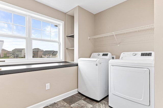 laundry area featuring independent washer and dryer