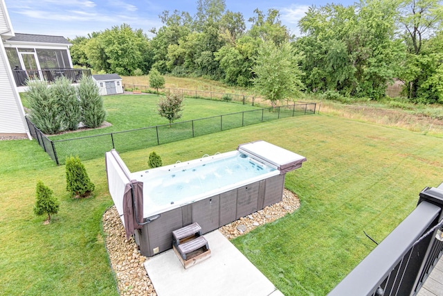 exterior space with a hot tub and a storage shed