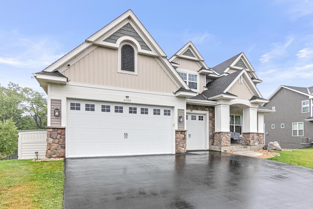 craftsman house featuring a garage