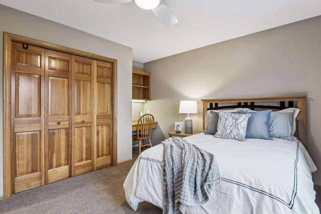 bedroom featuring ceiling fan, a closet, and carpet floors