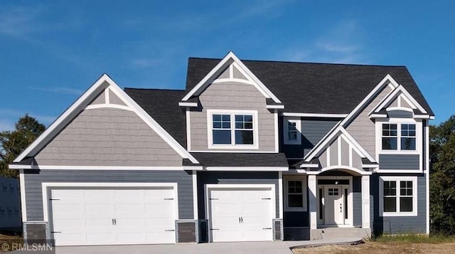 craftsman-style home featuring a garage