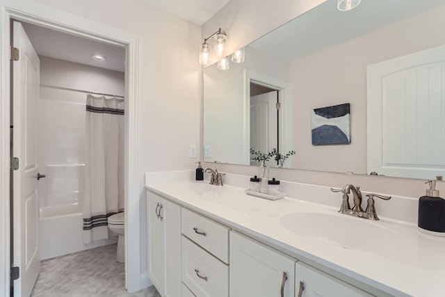 full bathroom featuring shower / tub combo, vanity, and toilet