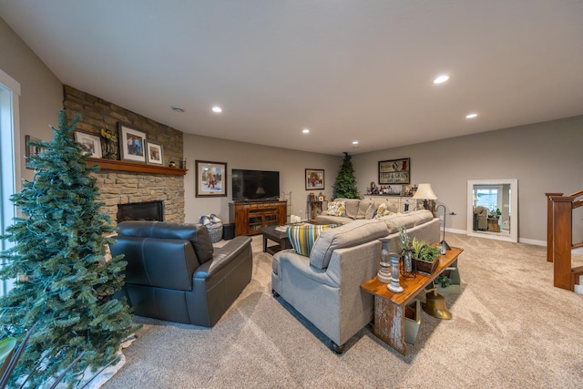 carpeted living room featuring a fireplace