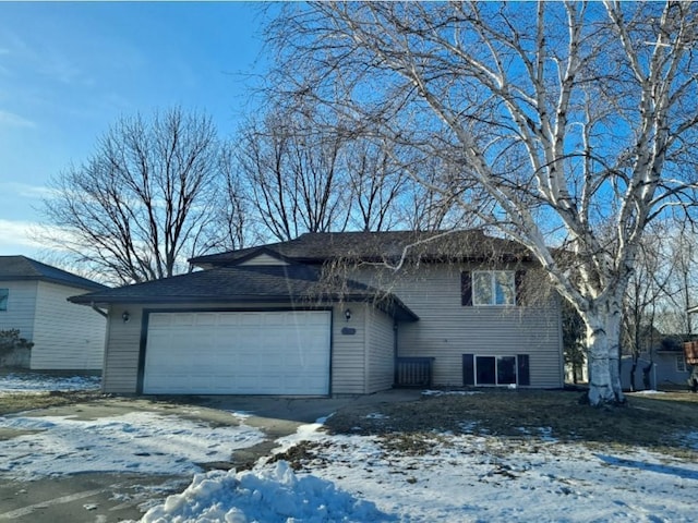 view of front of home with a garage