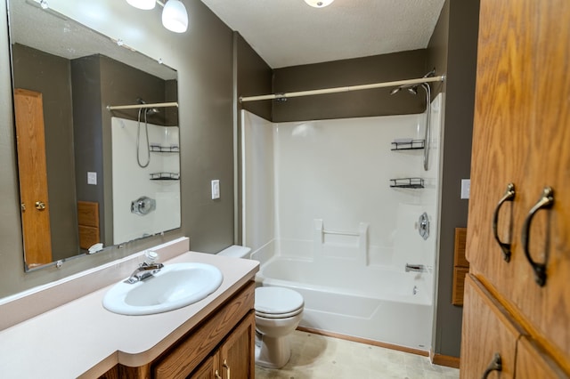 full bathroom with vanity, a textured ceiling, bathing tub / shower combination, and toilet