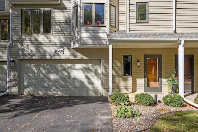 property entrance featuring a garage