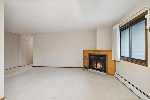 unfurnished living room featuring baseboard heating and light colored carpet