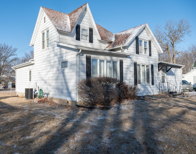 view of property exterior featuring cooling unit