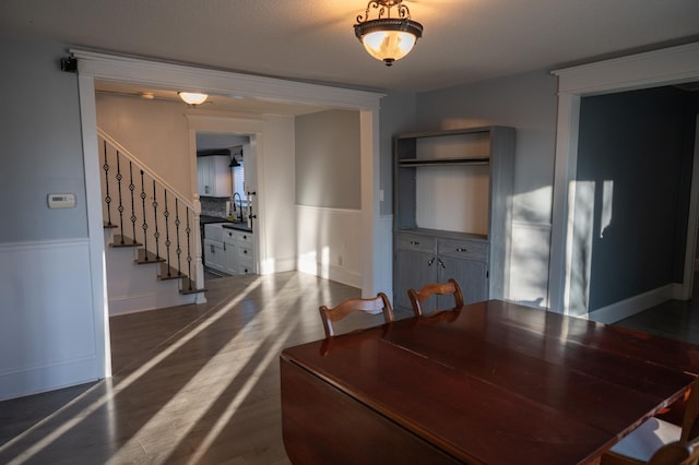 dining room with dark wood-type flooring