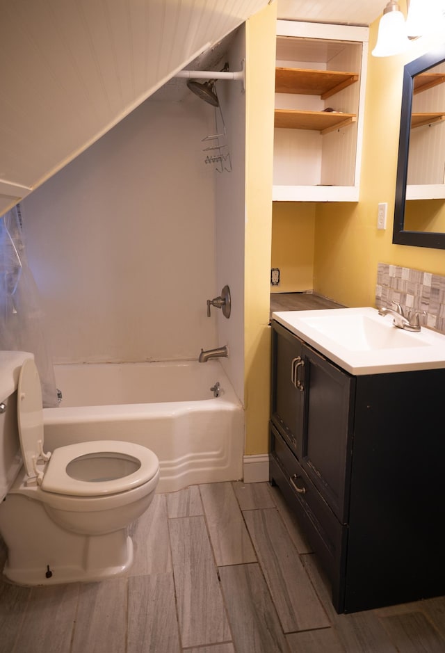 full bathroom featuring toilet, vanity, and shower / bath combination