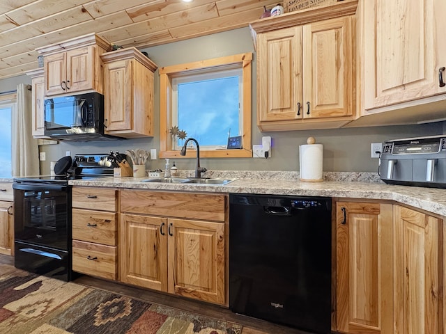 kitchen with wooden ceiling, black appliances, a wealth of natural light, and sink