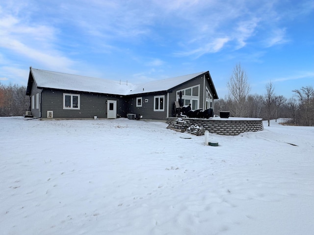 view of snow covered house