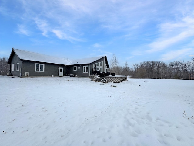 view of snow covered house