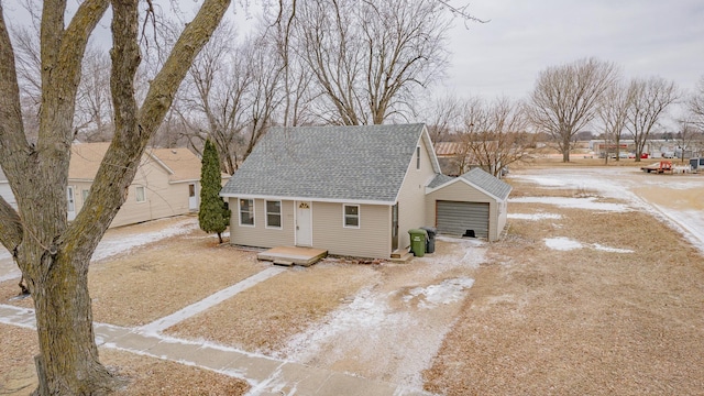 view of front of home with an outbuilding and a garage