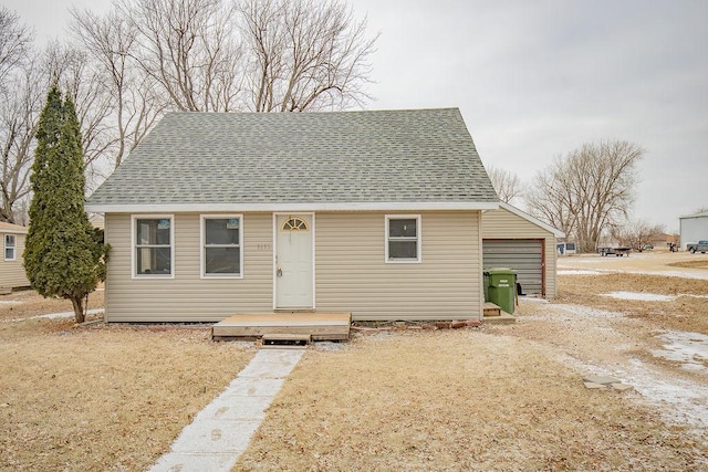 bungalow-style house featuring a front yard