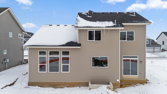 view of snow covered property