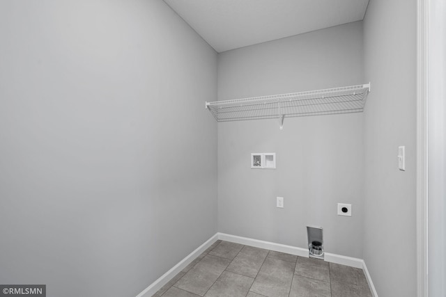 laundry room with washer hookup, tile patterned flooring, and hookup for an electric dryer