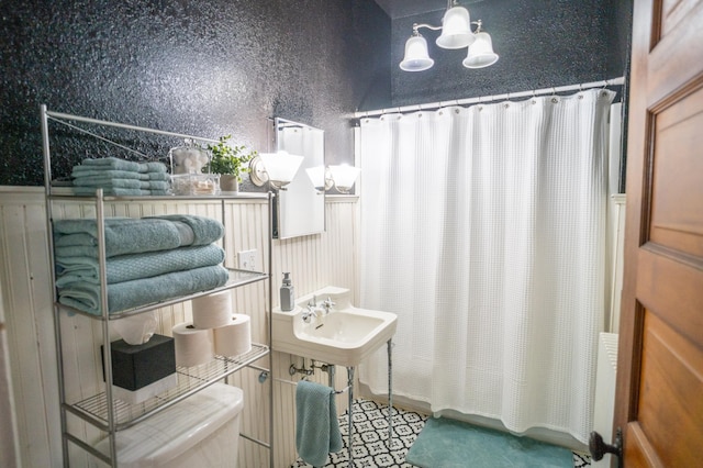 bathroom featuring a shower with curtain