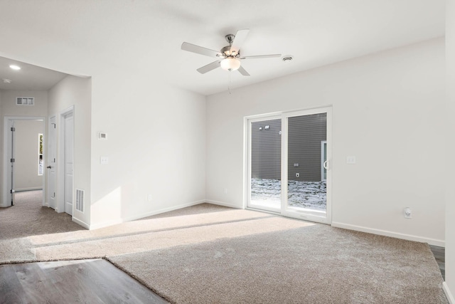 spare room with ceiling fan