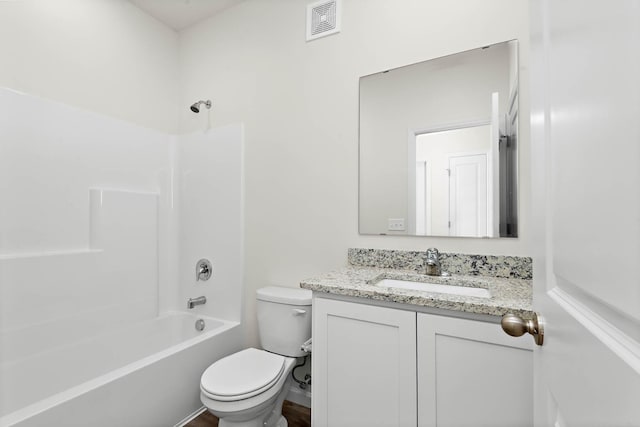 full bathroom featuring vanity, shower / bath combination, and toilet