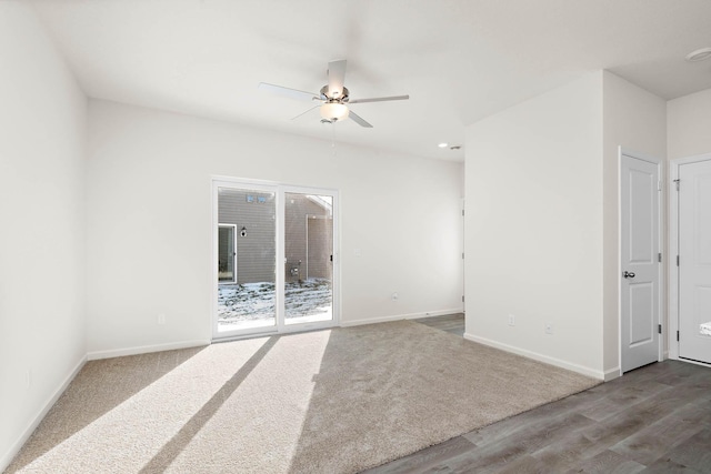 unfurnished room with hardwood / wood-style floors and ceiling fan