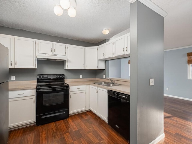 kitchen featuring black appliances, dark hardwood / wood-style flooring, white cabinets, and sink