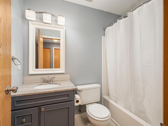 full bathroom with shower / bathtub combination with curtain, a textured ceiling, vanity, and toilet