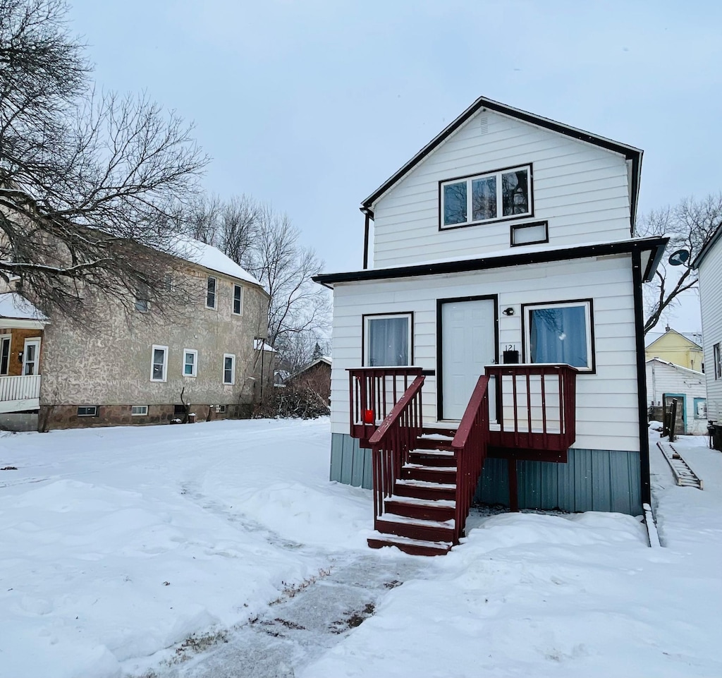 view of snow covered property