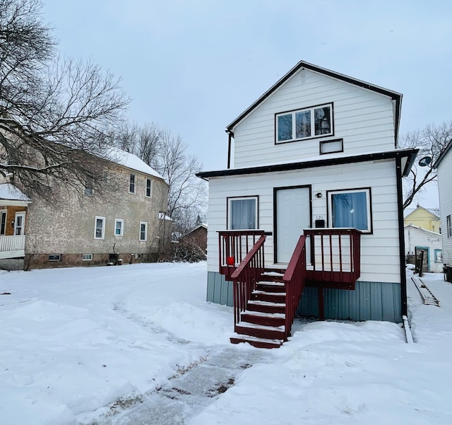 view of snow covered property