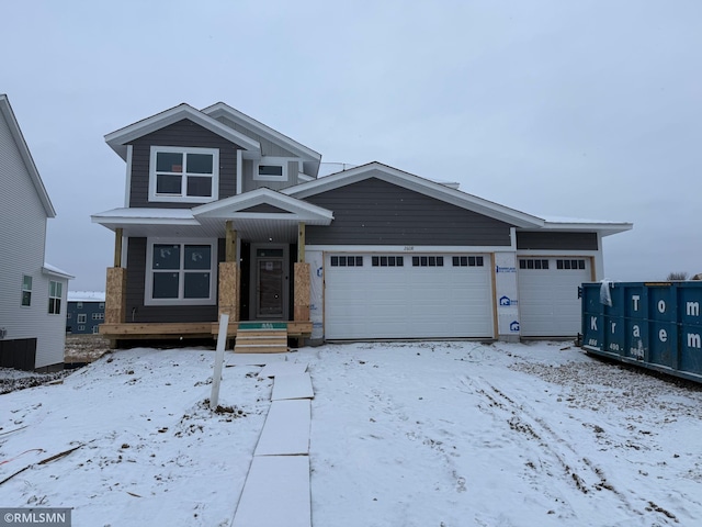 craftsman-style home with a garage