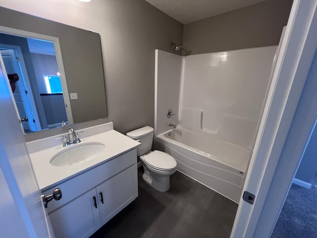 full bathroom with vanity, toilet, and shower / washtub combination