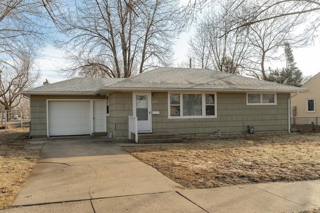 single story home with a garage