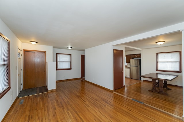 spare room featuring hardwood / wood-style floors