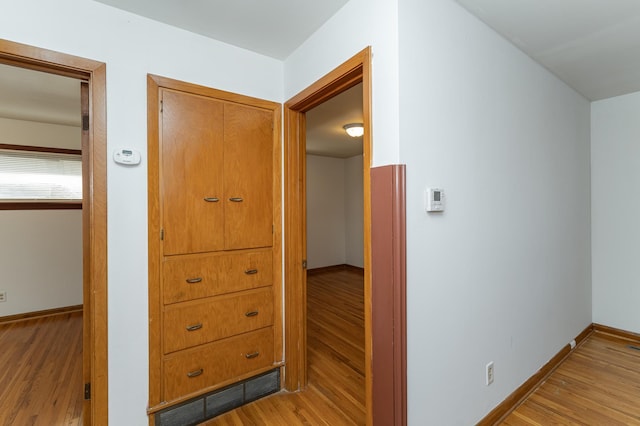 hall featuring light hardwood / wood-style floors