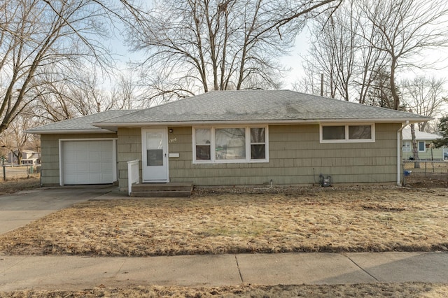 single story home featuring a garage