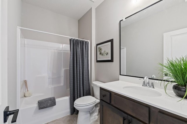 full bathroom featuring vanity, shower / tub combo, and toilet